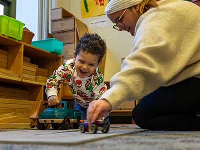 child playing in nursery school