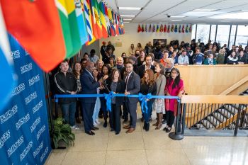 DCC President Dr. Peter Grant Jordan cuts the ribbon at the International Flag Display celebration on Nov. 15, joined by Interim Chief Diversity Officer Dr. Melissa Carlo, Diversity Council Co-chairs Tomasine Oliphant and Steven Posada, Chief of Staff and Vice President for Institutional Effectiveness Dr. Susan Rogers and Student Trustee Bobby Biersack.